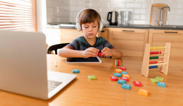 Baby playing with colorful building blocks for creativity and learning